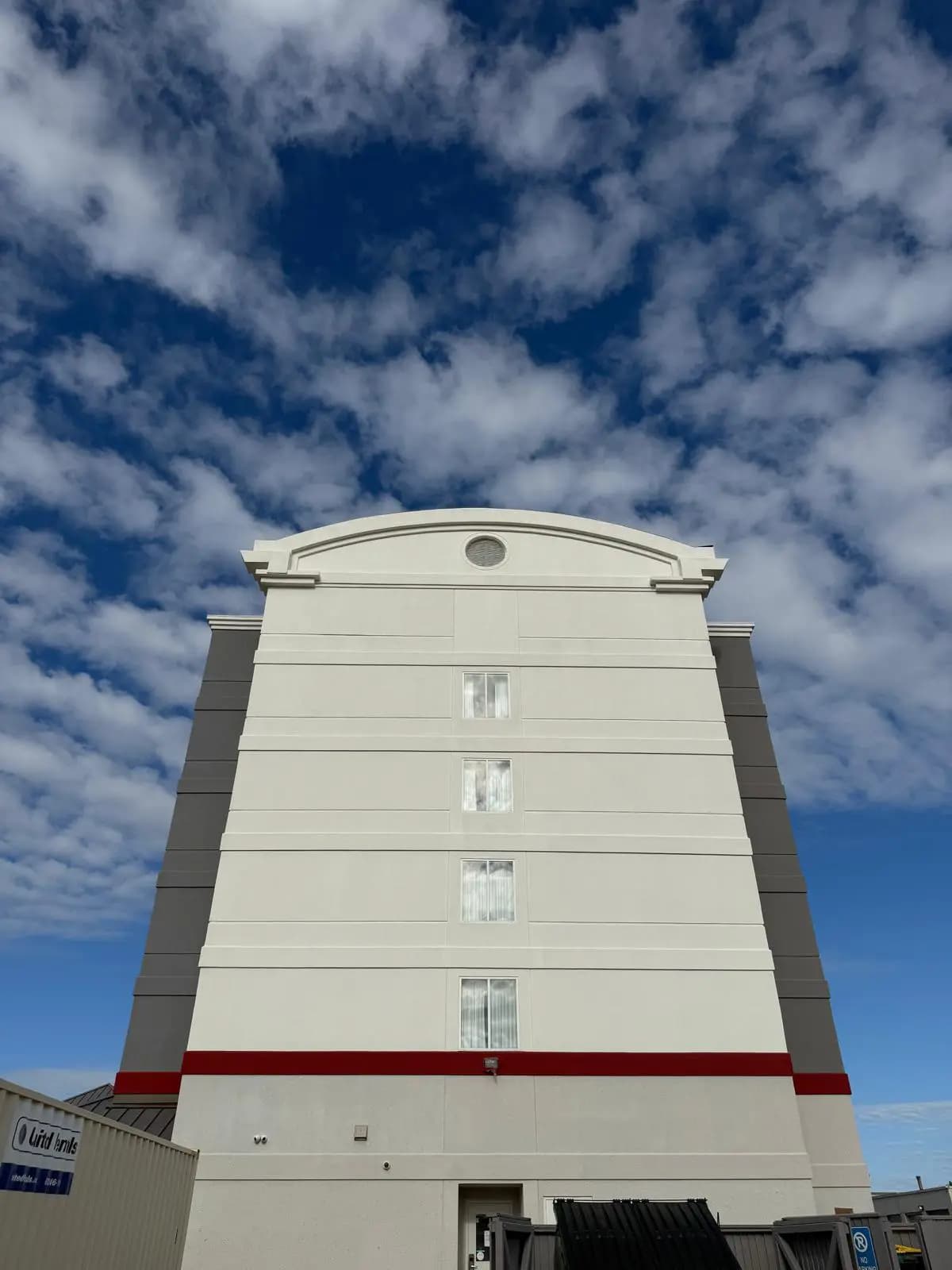 Hilton Garden Inn, Edmonton — End elevation with the arched parapet and oculus vent picked out